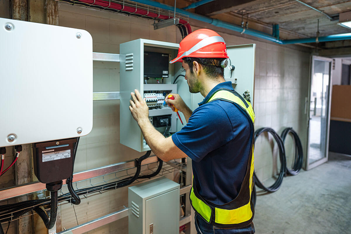 LH Electrical servicing a commercial electrical panel in East Sussex