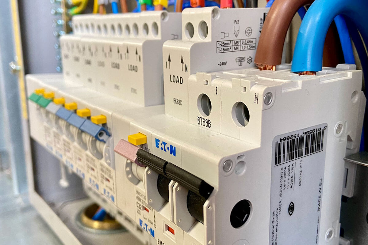 Close-up of a modern RCBO-protected consumer unit fitted by LH Electrical